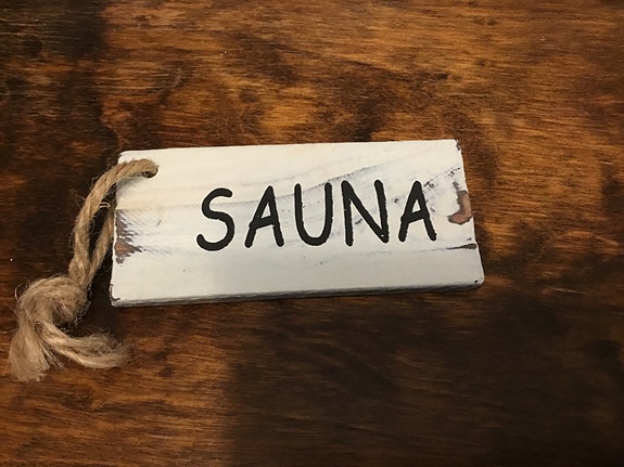 Sauna kyltti