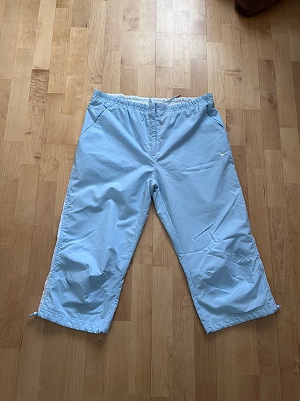 Vaaleansiniset caprihousut ( Nike ) L-koko