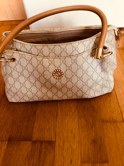 naisten laukku, koko 40-30, nouto, hinta yhdelle