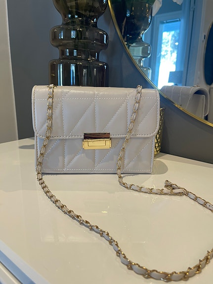 Laukku beige