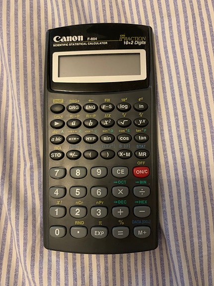 Canon F-604 laskin