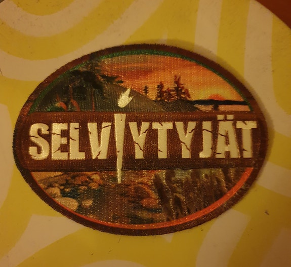 Selviytyjät pohjola hihamerkki 5. Tuotantokausi