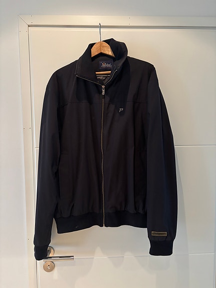 Peak Performance musta välikausitakki koko XL