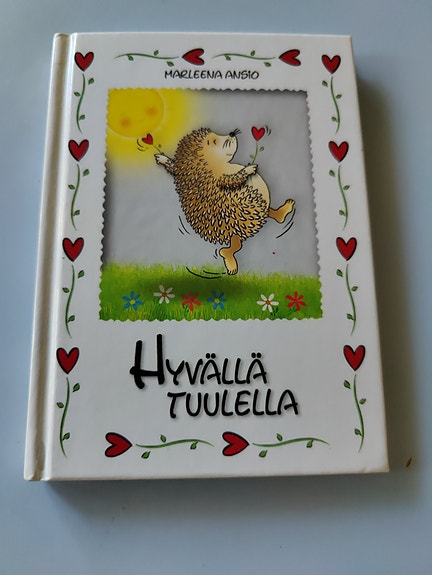 Hyvällä tuulella-kirjanen