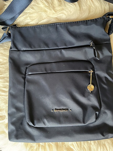 Samsonite tummansininen olkalaukku