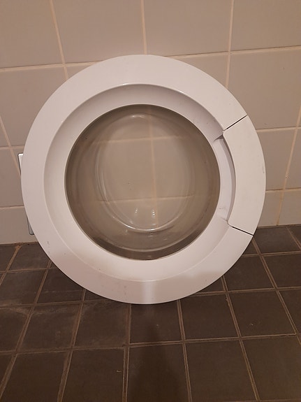 AEG pesukoneen luukku