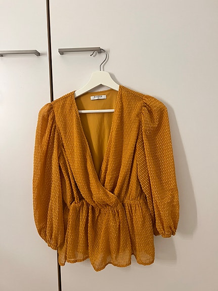 Peplum toppi