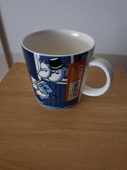 Muumimuki Jouluyllätys(2009)-Tarra-käyttämätön ja virheetön 70€+9.90posti/nouto
