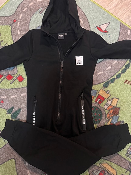 WOXO 720° black jumpsuit, size 122/128