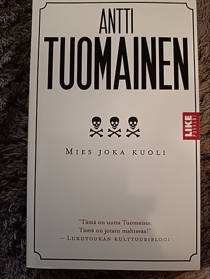 Antti Tuomainen : Mies joka kuoli