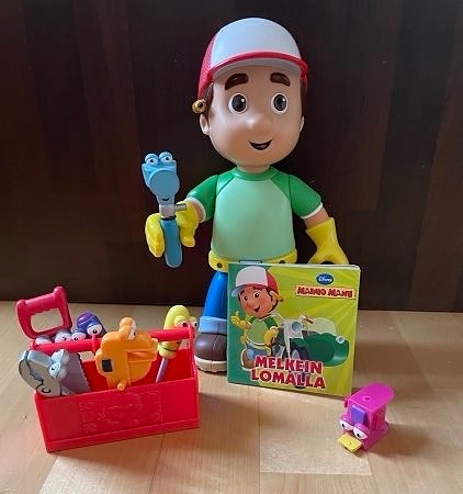 Mainio Manu ja työkalupakki ja kirjanen