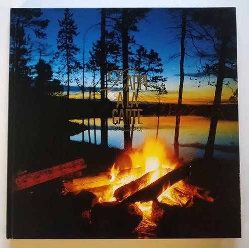 Lappi a la carte : Erä ja Tulistelu  Sidottu, kuvakantinen kirja.