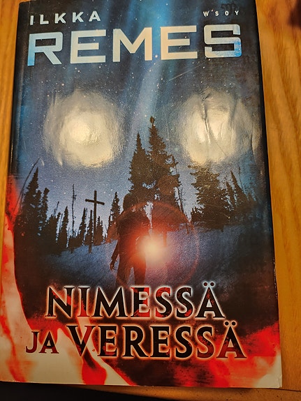 Remes Nimessä ja veressä kirja