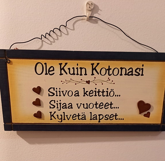 Koriste taulu tekstillä