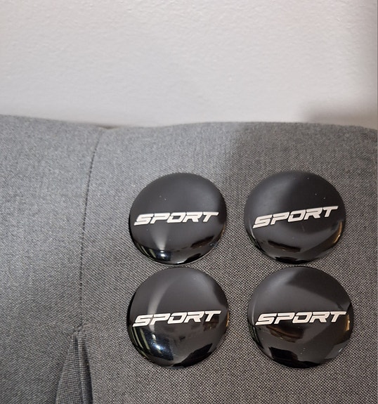 Vanteen keskiö tarra Sport