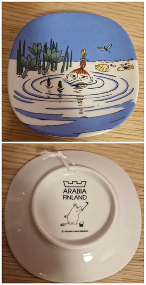 Pikku Myy uimassa seinälautanen