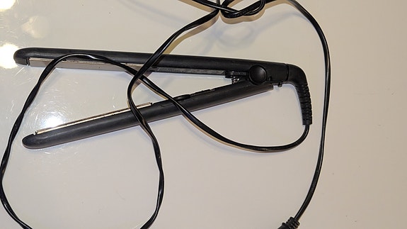 Remington hiusten suoristusrauta musta