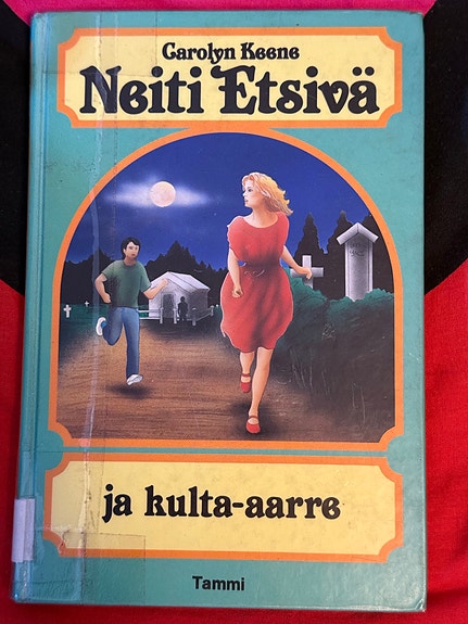 Neiti Etsivä ja kulta-aarre kirja