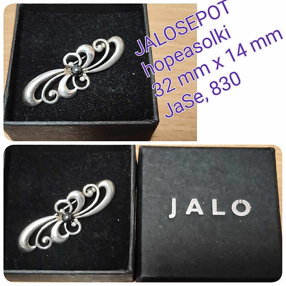 Jaloseppojen hopeasolki, jossa musta kivi