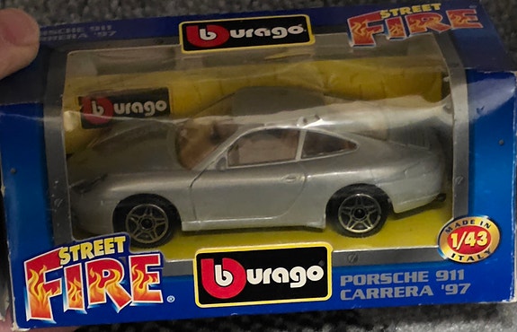 Porsche Carrera GT hopea 1:43
