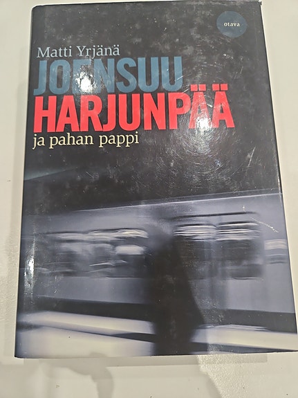 Harjunpää ja pahan pappi, Matti Yrjänä Joensuu