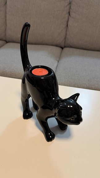 Partylite musta kissa tuikkualusta