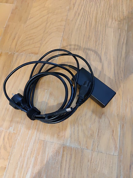 HP tietokoneen virtalähde