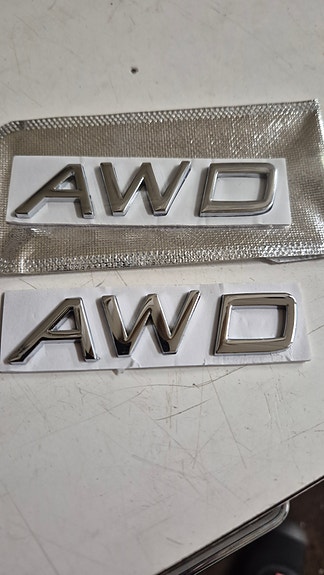 AWD-merkit