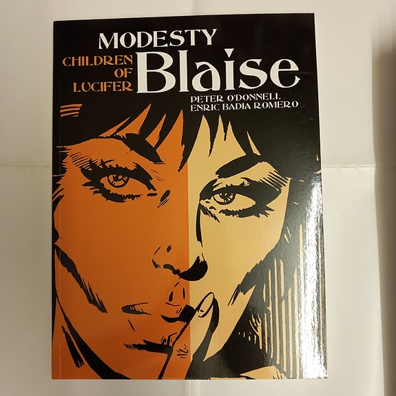 Modesty Blaise Titan books albumi valikoima