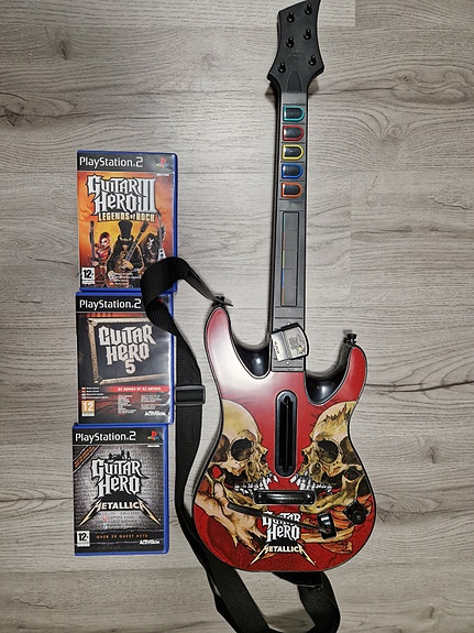 Guitar Hero pelit ja kitara pelipaketti