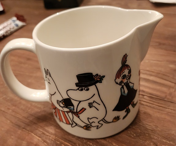 Muumikannu/kaadin Iloinen perhe