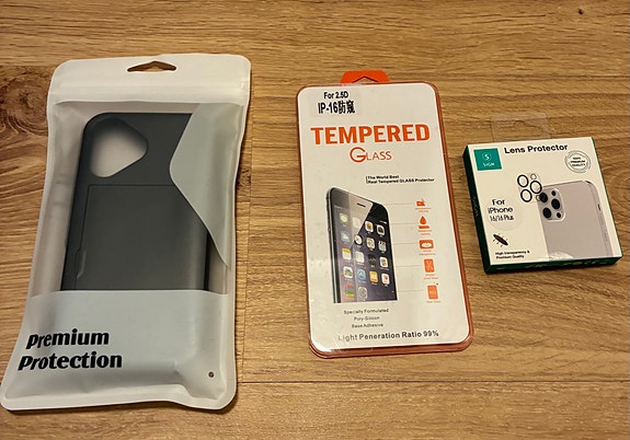 Apple puhelintarvikkeet suojakuori, panssarilasi ja kameran linssinsuoja