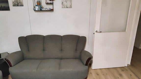 three seater grey sofa