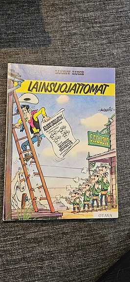 Lucky Luke Lainsuojattomat sarjakuva-albumi kovakantinen