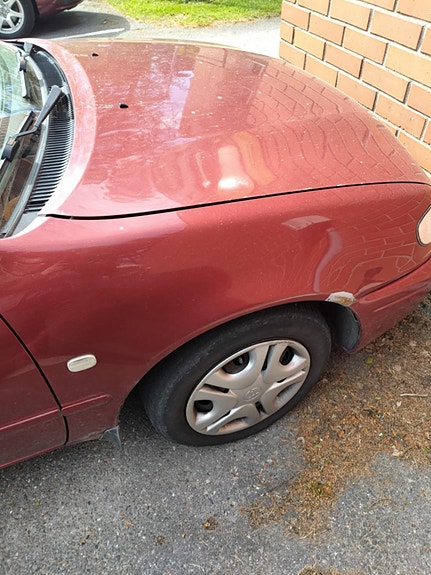 Etulokasuoja - Toyota Corolla vm2000