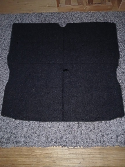 Auton tavaratilan suoja