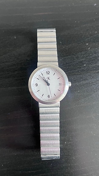 Calvin Klein rannekello unisex metallirannekkeella