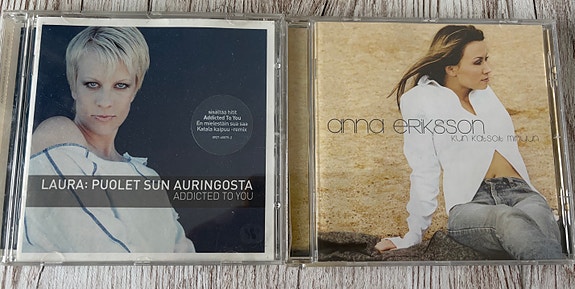 CD:t; Anna Eriksson: Kun katsoit minuun ja Laura: Puolet sun auringosta