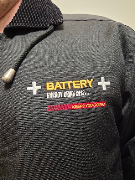 Battery toppatakki