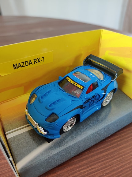 Mazda RX-7 1:55 die-cast pienoismalli – X-Tuner – Uusi pakkauksessa