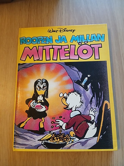 Disney sarjakuvakirja Roopen ja Millan mittelöt vintage posteineen
