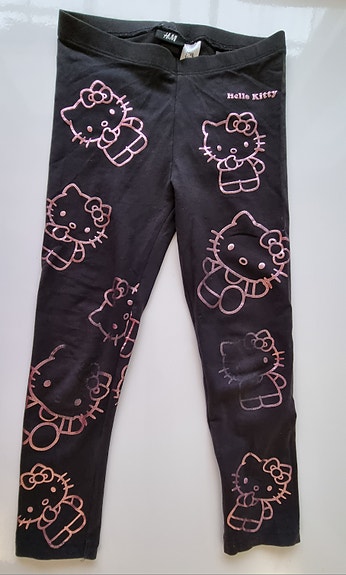Mustat Hello Kitty trikoot koko 122cm