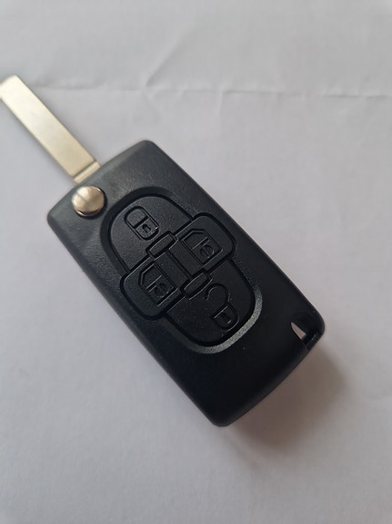 Peugeot auton avainkaukosäädin musta