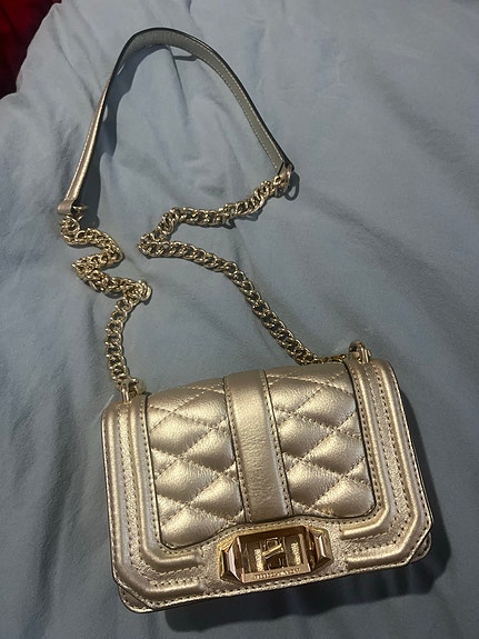Kultainen Rebecca Minkoff laukku