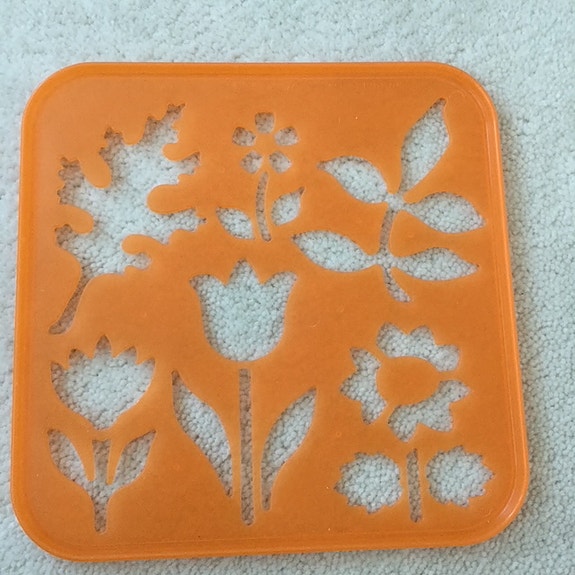Tupperware piirustuslevy kukkia