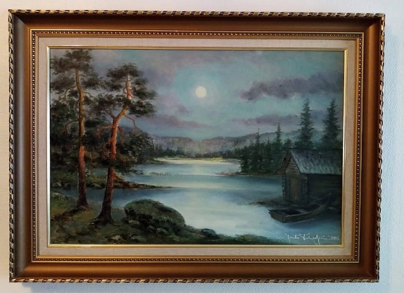Suuri taulu kultakehyksillä