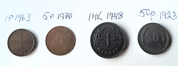 Neljä vanhaa kolikkoa