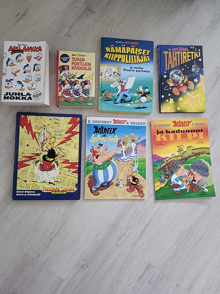 Sarjakuvakirjat Asterix ja Aku Ankka suomeksi