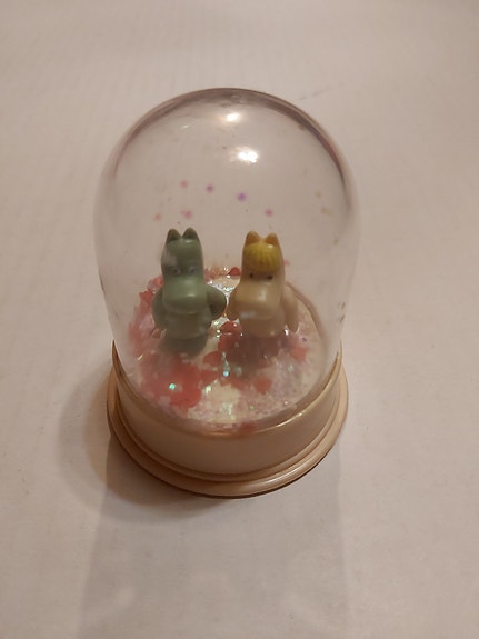 Muumipeikko ja Niiskuneiti lumipallo