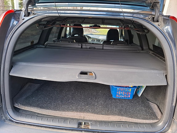 Volvo V70 takakontin suojaverho